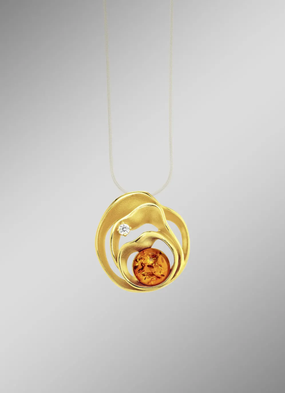 Begeisternder Anhänger mit Bernstein und synth. Zirkonia