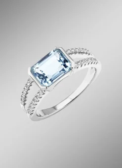 Eleganz trifft auf Zeitlosigkeit: Damenring mit Blautopas und synth. Zirkonia