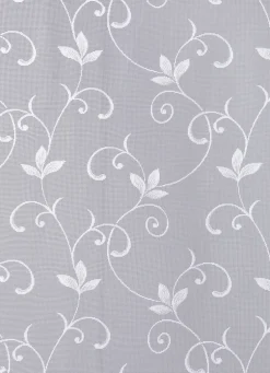 Filigraner Blumenfenster-Store mit gebogten Abschlüssen