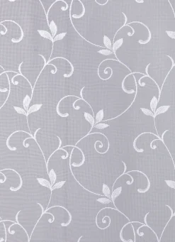 Filigraner Blumenfenster-Store mit gebogten Abschlüssen