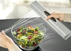 Folienspender mit Federmechanismus