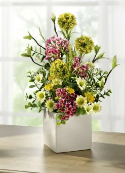 Gesteck in weißen Keramiktopf