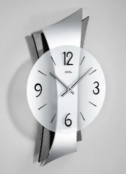 Hochwertige Wanduhr aus Messing mit geschwungener Rückwand