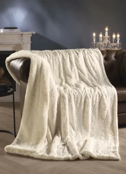 Kuschelige Wohndecke aus Webpelz-Fellimitat