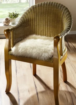 Merino-Lammfell-Sitzauflage in Tierform