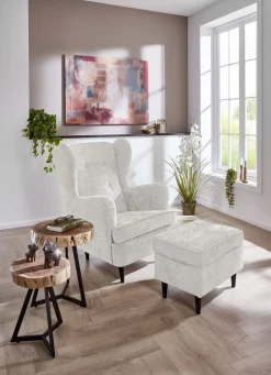 Ohrenbackensessel mit Hocker