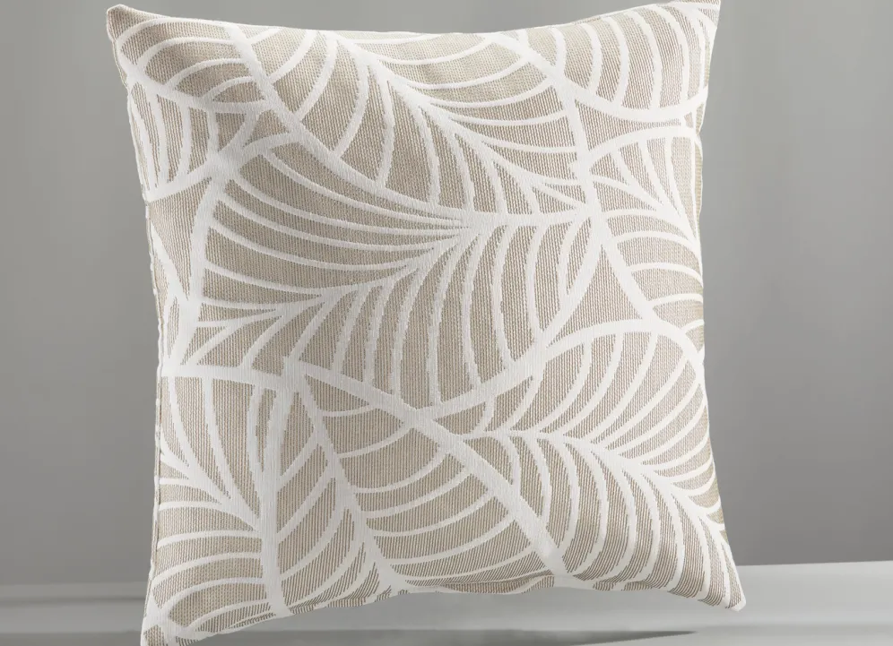 Tagesdecke und Kissenbezüge mit naturnahen Blättermotiven