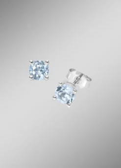 Zeitlose Eleganz: Ohrstecker mit beh. Blautopas